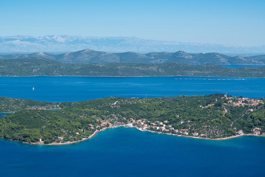 Panoramic view of a traditional Croatian coastal village at dusk