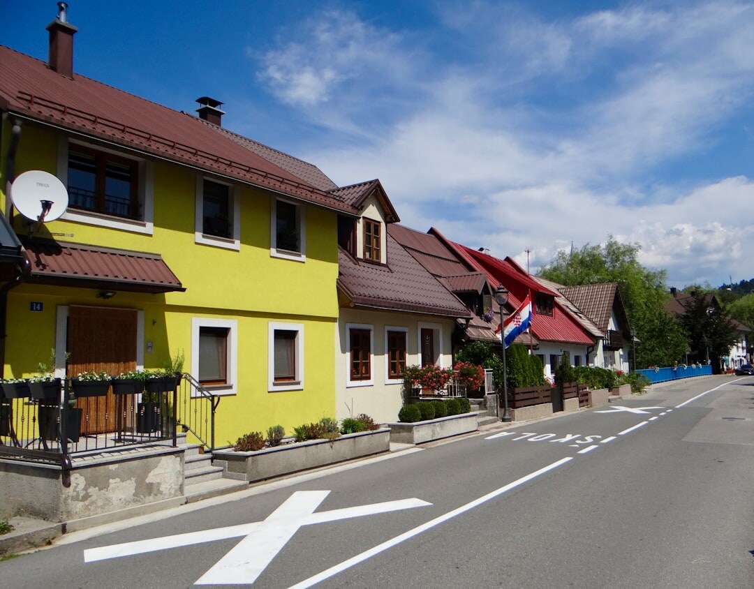 Small documentary photography team working in a Croatian village street